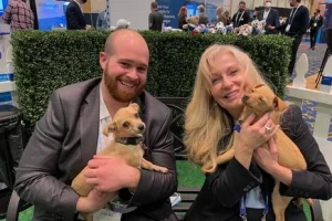 Puppies at a trade show? Genius!!
