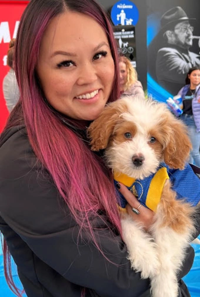 Warriors And Wagging Tails 5 This woman and pup enjoy the warriors game.